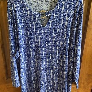 Traveler’s size 4 top. Never worn.